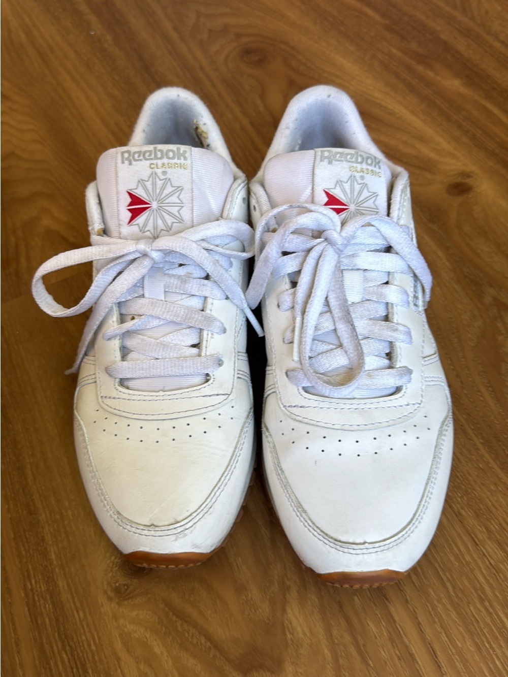Reebok White Leather Sneakers with Red Star Accent